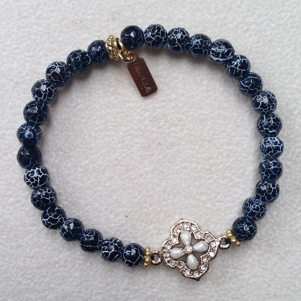 On Sale - Iced onyx bracelet With the mother of pearl flower